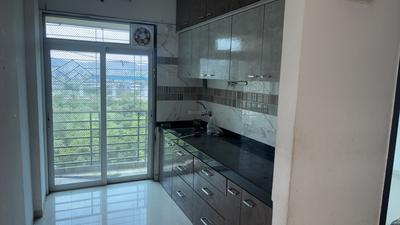 Kitchen Image of 800 Sq.ft 2 BHK Apartment / Flat for rent in Om Paraiso, Mothi Desai Gaon Thane for Rs. 21000
