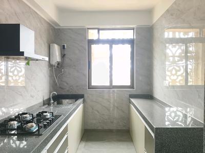 Kitchen Image of 1115 Sq.ft 2 BHK Apartment / Flat for rent in Tharwani Majestic Towers Phase I, Kalyan West Kalyan for Rs. 29500