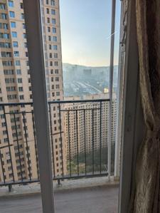 Balcony Image of 850 Sq.ft 2 BHK Apartment / Flat for rent in Rustomjee Azziano, Thane West Thane for Rs. 50000