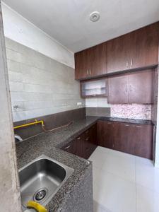Kitchen Image of 600 Sq.ft 2 BHK Apartment / Flat for rent in Hrishikesh Kishor Park, Vaishno Devi Circle Ahmedabad for Rs. 25000