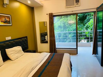 Bedroom Image of Urbanroomz Coliving PG in DLF Phase 4, Gurgaon