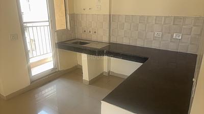 Kitchen Image of 650 Sq.ft 2 BHK Apartment / Flat for sale in Aditya City Apartment Ghaziabad, Wave City Ghaziabad for Rs. 5800000