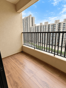 Balcony Image of 850 Sq.ft 2 BHK Apartment / Flat for rent in Dudulgaon Pune for Rs. 18000
