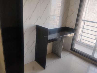 Kitchen Image of 695 Sq.ft 1 BHK Apartment / Flat for sale in Bhoomi Lawns Phase II, Shilgaon Thane for Rs. 3900000