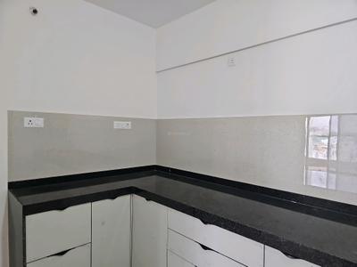 Kitchen Image of 940 Sq.ft 2 BHK Apartment / Flat for sale in Nivasa Enchante Phase 1 &amp; 2, Lohegaon Pune for Rs. 8000000