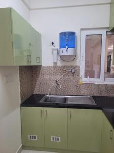 Kitchen Image of 600 Sq.ft 1 BHK Apartment / Flat for rent in Olympia Opaline, Navalur Chennai for Rs. 27000