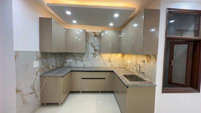 Kitchen Image of 950 Sq.ft 3 BHK Apartment / Flat for sale in Chhattarpur New Delhi for Rs. 7500000