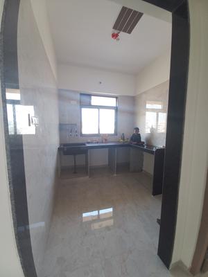 Kitchen Image of 710 Sq.ft 1 BHK Apartment / Flat for sale in Ulhasnagar Thane for Rs. 4800000