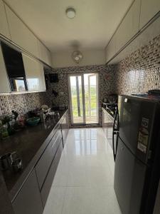 Kitchen Image of 1000 Sq.ft 2 BHK Apartment / Flat for rent in Arihant Aarohi, Shilgaon Thane for Rs. 29000