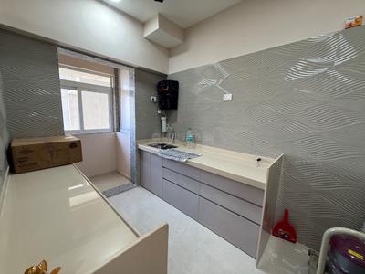 Kitchen Image of 850 Sq.ft 2 BHK Apartment / Flat for rent in Raunak Unnathi Woods Supreme, Hiranandani Estate Thane for Rs. 31000
