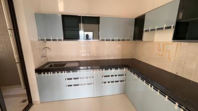 Kitchen Image of 850 Sq.ft 2 BHK Apartment / Flat for rent in Shapoorji Pallonji Joyville Sensorium, Maan Pune for Rs. 25899