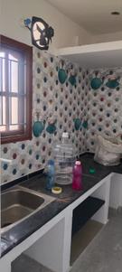 Kitchen Image of 850 Sq.ft 2 BHK Independent House for rent in Injambakkam Chennai for Rs. 23000