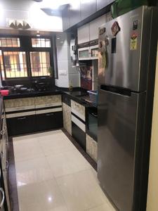 Kitchen Image of 910 Sq.ft 2 BHK Apartment / Flat for rent in Kasarvadavali Thane for Rs. 28000