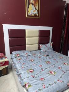 Bedroom Image of Chandok pg in Tilak Nagar, New Delhi