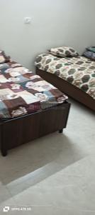 Bedroom Image of Aakriti Paying Guest  in New Industrial Township, Faridabad