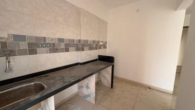 Kitchen Image of 1150 Sq.ft 2 BHK Apartment / Flat for sale in Shivparvati Shreeji Glacia, Ulwe Navi Mumbai for Rs. 8800000