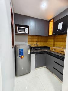 Kitchen Image of 850 Sq.ft 1 BHK Builder Floor for rent in Pioneer Floors - 8, Sector 15 Gurgaon for Rs. 31000