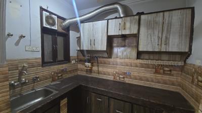 Kitchen Image of 980 Sq.ft 3 BHK Apartment / Flat for sale in Rajpur Khurd Extension New Delhi for Rs. 5000000