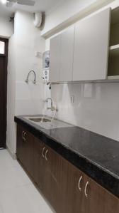 Kitchen Image of 1550 Sq.ft 2 BHK Apartment / Flat for rent in Cosmos Express 99, Sector 99 Gurgaon for Rs. 30000