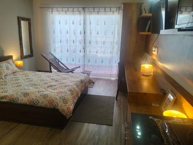 Bedroom Image of 435 Sq.ft 1 RK Apartment / Flat for rent in Paramount Golfforeste Premium Apartments, Surajpur Greater Noida for Rs. 15200