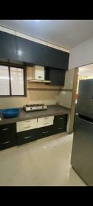 Kitchen Image of 1227 Sq.ft 2 BHK Apartment / Flat for rent in Happy Home Nakshatra Platinum, Pal Surat for Rs. 25000