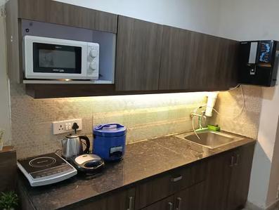 Kitchen Image of 435 Sq.ft 1 RK Apartment / Flat for rent in Paramount Golfforeste Oak &amp; Pine, Surajpur Greater Noida for Rs. 15000