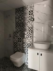 Common Bathroom Image of 1240 Sq.ft 2 BHK Apartment / Flat for sale in Future Estate, Noida Extension Greater Noida for Rs. 9905000