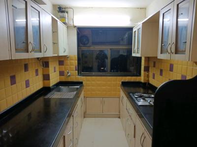 Kitchen Image of 550 Sq.ft 1 BHK Apartment / Flat for rent in Ajmera Greenfinity Wing C And D, Wadala Mumbai for Rs. 53000