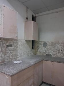 Kitchen Image of 600 Sq.ft 1 BHK Apartment / Flat for sale in GCM Gomati Apartment, Sector 49 Noida for Rs. 2500000