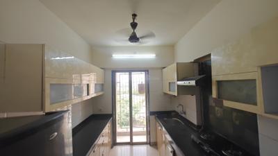 Kitchen Image of 951 Sq.ft 2 BHK Apartment / Flat for rent in Madhav Palacia, Hiranandani Estate Thane for Rs. 35000