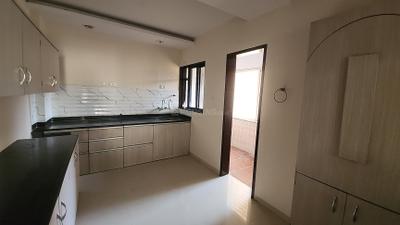Kitchen Image of 1150 Sq.ft 2 BHK Apartment / Flat for rent in Pankaj Aasmaan, Lohegaon Pune for Rs. 24000