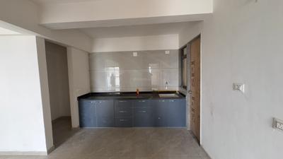 Kitchen Image of 1040 Sq.ft 2 BHK Apartment / Flat for rent in Om Shivam Heights, Vavol Gandhinagar for Rs. 15000