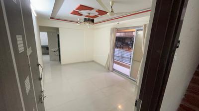 Living Room Image of 850 Sq.ft 2 BHK Apartment / Flat for sale in Shreeji Krishna Nayan Complex Phase I, Badlapur East Badlapur for Rs. 3455000