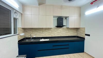 Kitchen Image of 1050 Sq.ft 2 BHK Apartment / Flat for sale in VTP Beaumonde Building T2, Manjari Khurd Pune for Rs. 8500000