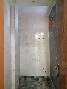 Common Bathroom Image of 600 Sq.ft 2 BHK Builder Floor for rent in Dwarka Mor New Delhi for Rs. 21000
