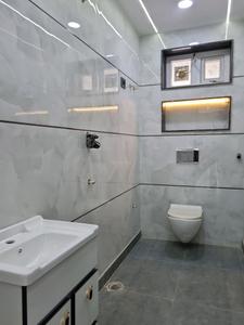 Common Bathroom Image of 810 Sq.ft 3 BHK Apartment / Flat for sale in Dwarka Mor New Delhi for Rs. 6800000