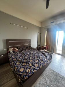 Bedroom Image of 440 Sq.ft 1 RK Studio for rent in Paramount Golfforeste Oak &amp; Pine, Surajpur Greater Noida for Rs. 15000