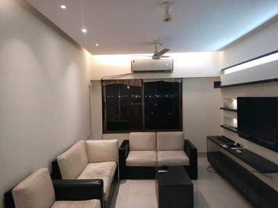 Living Room Image of 710 Sq.ft 2 BHK Apartment / Flat for rent in Ajmera Bhakti Park, Wadala East Mumbai for Rs. 70000