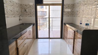 Kitchen Image of 1200 Sq.ft 2 BHK Apartment / Flat for rent in Anmol Eleganzia Royale, Andheri West Mumbai for Rs. 100000