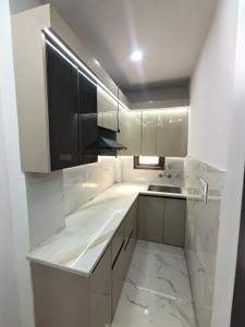 Kitchen Image of 550 Sq.ft 1 BHK Builder Floor for rent in Dwarka Mor New Delhi for Rs. 14500