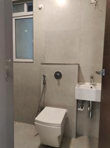 Common Bathroom Image of 710 Sq.ft 2 BHK Apartment / Flat for sale in Dotom Isle , Kandivali West Mumbai for Rs. 14400000
