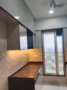Kitchen Image of 900 Sq.ft 2 BHK Apartment / Flat for rent in Metro Paramount, Shilgaon Thane for Rs. 26000