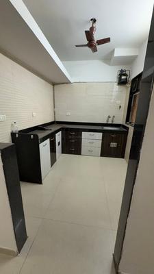 Kitchen Image of 800 Sq.ft 2 BHK Apartment / Flat for rent in Cosmos Jewels, Thane West Thane for Rs. 31000
