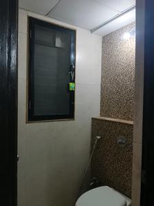 Common Bathroom Image of 720 Sq.ft 1 BHK Apartment / Flat for rent in Lodha Lakeshore Greens, Palava Phase 2 Thane for Rs. 15000