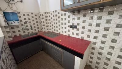 Kitchen Image of 700 Sq.ft 1 BHK Builder Floor for rent in Sector 57 Gurgaon for Rs. 25000