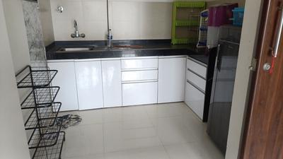 Kitchen Image of 650 Sq.ft 1 BHK Apartment / Flat for rent in Ajax Global Lifestyle Kharadi, Kharadi Pune for Rs. 32000