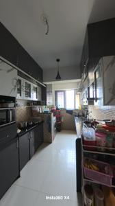 Kitchen Image of 1002 Sq.ft 2 BHK Apartment / Flat for sale in Saarrthi Skybay II, Mahalunge Pune for Rs. 9200000