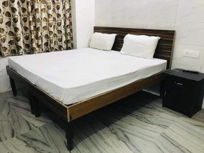 Bedroom Image of Trump pg in Sector 15 Dwarka, New Delhi