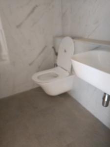 Common Bathroom Image of 1073 Sq.ft 2 BHK Apartment / Flat for sale in Lodha NIBM Project Tower 5 by Lodha Group, Mohammed Wadi Pune for Rs. 9800000