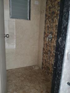 Common Bathroom One Image of 650 Sq.ft 1 BHK Apartment / Flat for sale in Dharti Krishna, Pushpak Nagar Navi Mumbai for Rs. 4620000